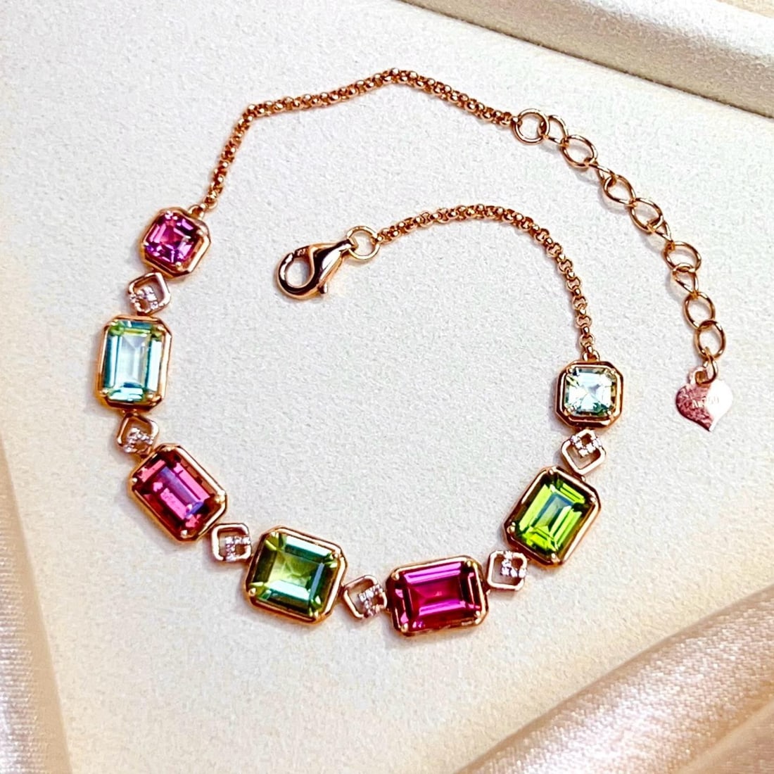 14k Gold 6.1 Ct Natural Tourmaline & Diamond Bracelet: Ref:231184301 // gold content:14k gold // main gemstone:tourmaline // shape:octagonal // carat weight:6. 1ct // color:color // treatment:natural // // adjacent gemstone 2 : diamond // number of