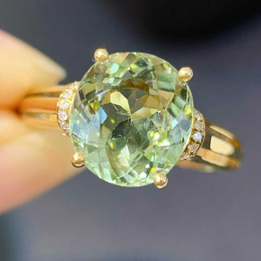 14k Gold 4.45 Ctw Natural Tourmaline & Diamond Ring: Ref:231184388 // gold content:14k gold // ring size:7. 25us // // main gemstone:tourmaline // shape:oval // carat weight:4. 41ct // color:green // treatment:natural // // adjacent gemstone 2 :