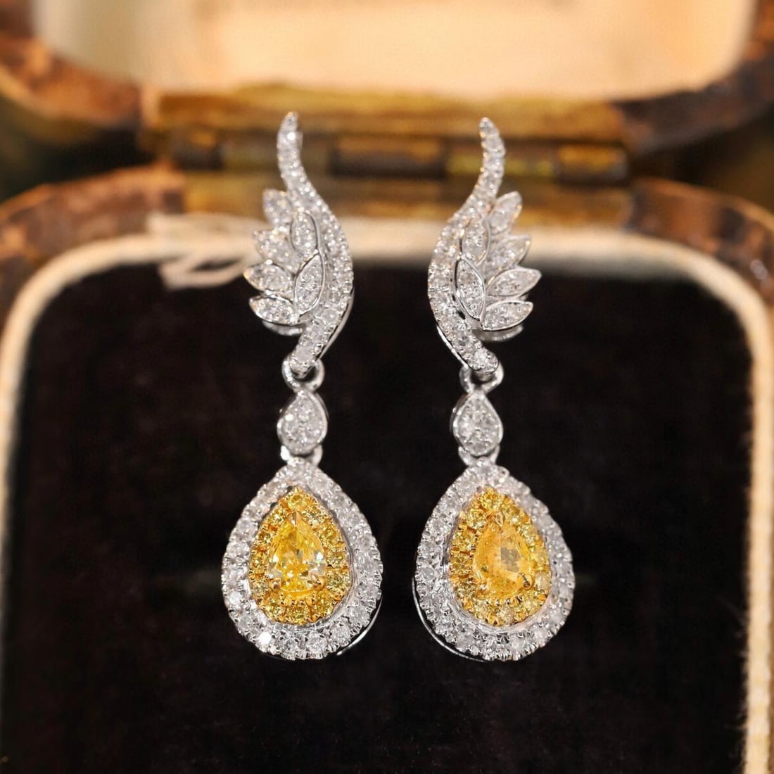 14k Gold 0.60 Ctw Natural Yellow Diamond & Diamond Earrings: Ref:231185002 // gold content:14k gold // main gemstone:yellow diamond // shape:pear // carat weight:0. 18ct // color:yellow // treatment:natural // // adjacent gemstone 2 : diamond // shape:round //