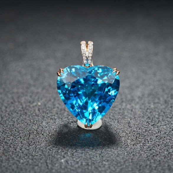 14k Gold 21.32 Ct Natural Topaz & Diamond Pendant( Without Chain ): Ref:231185006 // gold content:14k gold // main gemstone:topaz // shape:heart // carat weight:21. 32ct // color:blue // treatment:natural // // adjacent gemstone 2 : diamond // shape:round // clarity