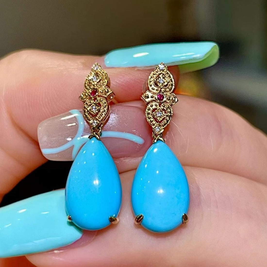 14k Gold 5.68 Ct Natural Blue Turquoise & Diamond & Ruby Earrings: Ref:231185021 // gold content:14k gold // main gemstone:blue turquoise // number of stones:2 // shape:pear // carat weight:5. 68ct // color:blue // treatment:natural // // adjacent gemstone 2 : diamon