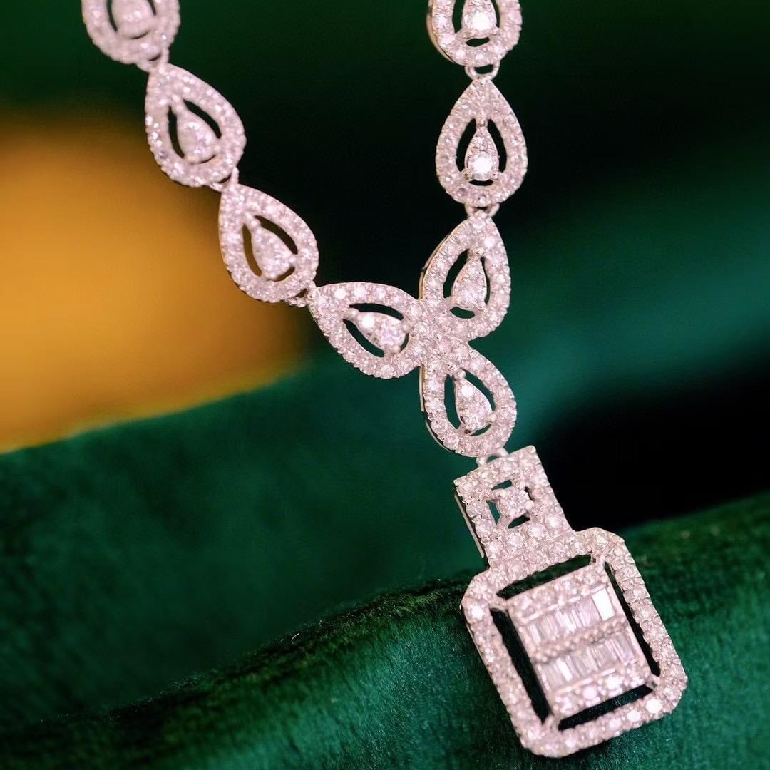 14k Gold 1.15 Ct Natural H Diamond Necklace: Ref:231185040 // gold content:14k gold // main gemstone:diamond // shape:multiple // carat weight:1. 15ct // clarity grade:vs-si // color:h // treatment:natural // Condition: New Low Estimate: