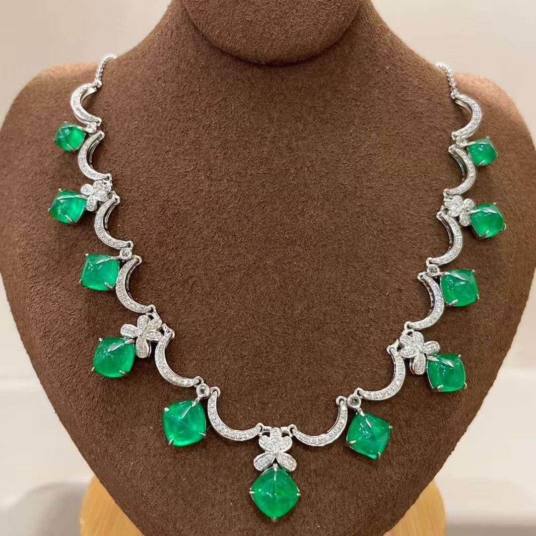 14k Gold 10.57 Ct Natural Emerald & Diamond & Sapphire Necklace: Ref:231185054 // gold content:14k gold // main gemstone:emerald // number of stones:11 // shape:sugar-loaf // carat weight:10. 57ct // color:green // treatment:natural // // adjacent gemstone 2 :