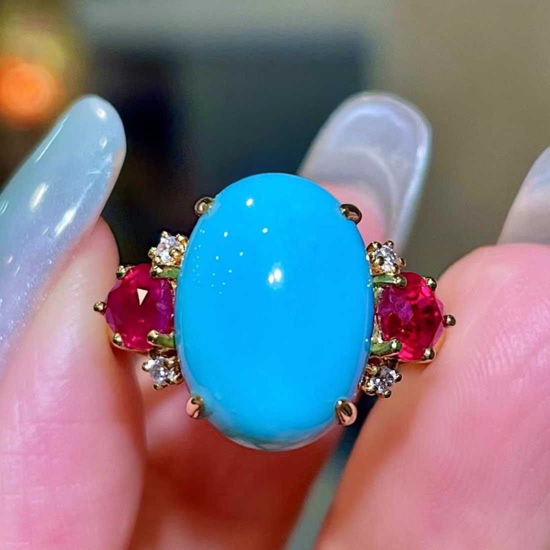 14k Gold 7.85 Ctw Natural Blue Turquoise & Ruby Ring: Ref:231185064 // gold content:14k gold // ring size:7. 25us // // main gemstone:blue turquoise // shape:oval // carat weight:6. 83ct // color:blue // treatment:natural // // adjacent gemstone 2 : ruby