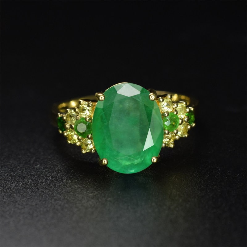 14k Gold 2.63 Ctw Natural Emerald & Sapphire Ring: Ref:231185096 // gold content:14k gold // ring size:7. 25us // // main gemstone:emerald // shape:oval // carat weight:2. 47ct // color:green // treatment:natural // // adjacent gemstone 2 : sapphire