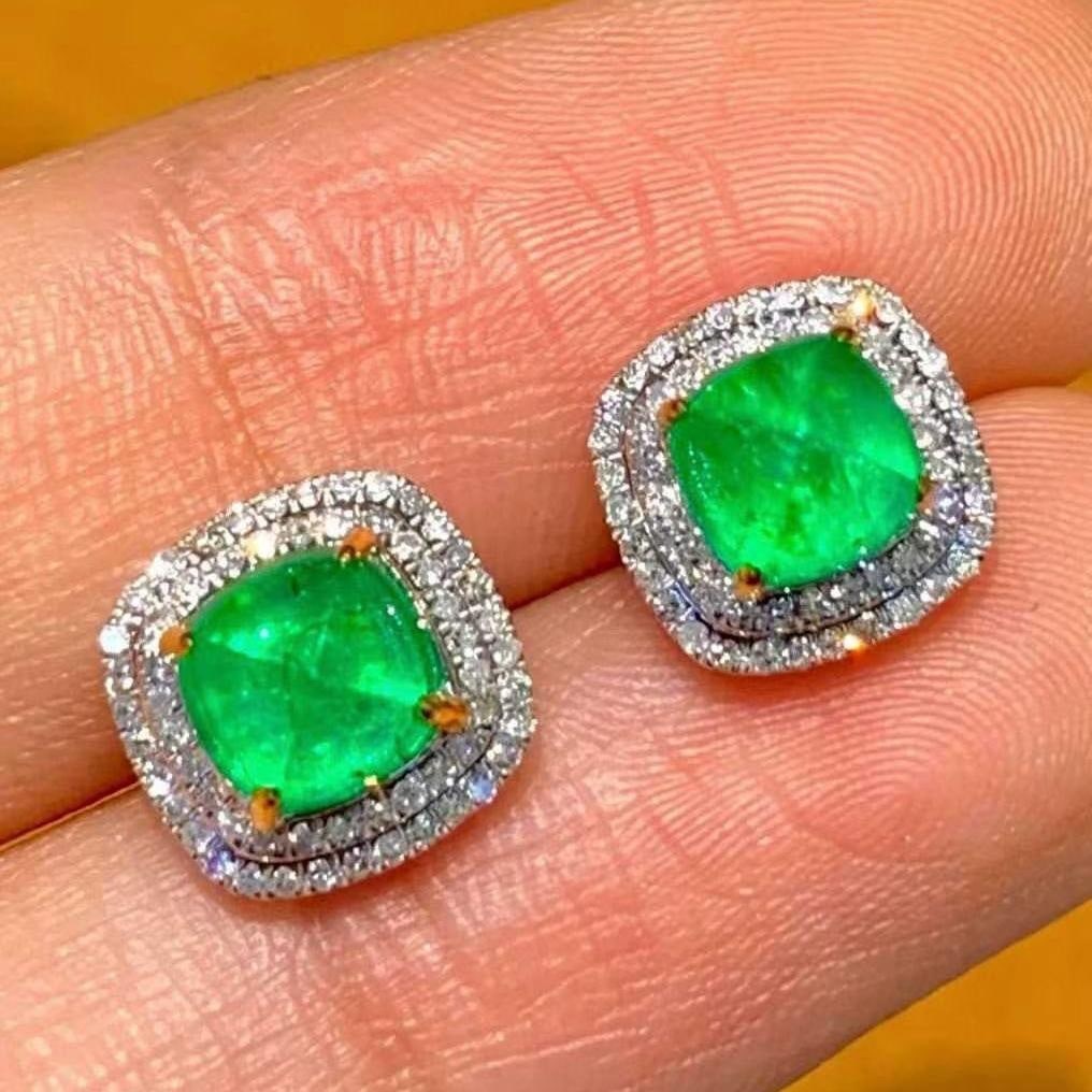 14k Gold 1.9 Ct Natural Emerald & Diamond Earrings: Ref:231185102 // gold content:14k gold // main gemstone:emerald // number of stones:2 // shape:sugar-loaf // carat weight:1. 9ct // color:green // treatment:natural // // adjacent gemstone 2 :