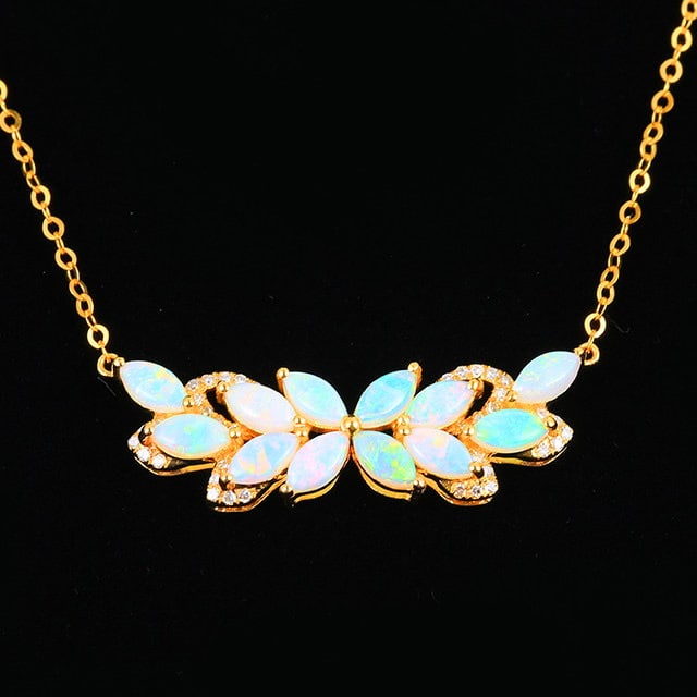 14k Gold 1.19 Ctw Natural Opal & Diamond Necklace: Ref:231185107 // gold content:14k gold // main gemstone:opal // shape:marquise // carat weight:1. 08ct // color:white // treatment:natural // // adjacent gemstone 2 : diamond // number of stones:38 //