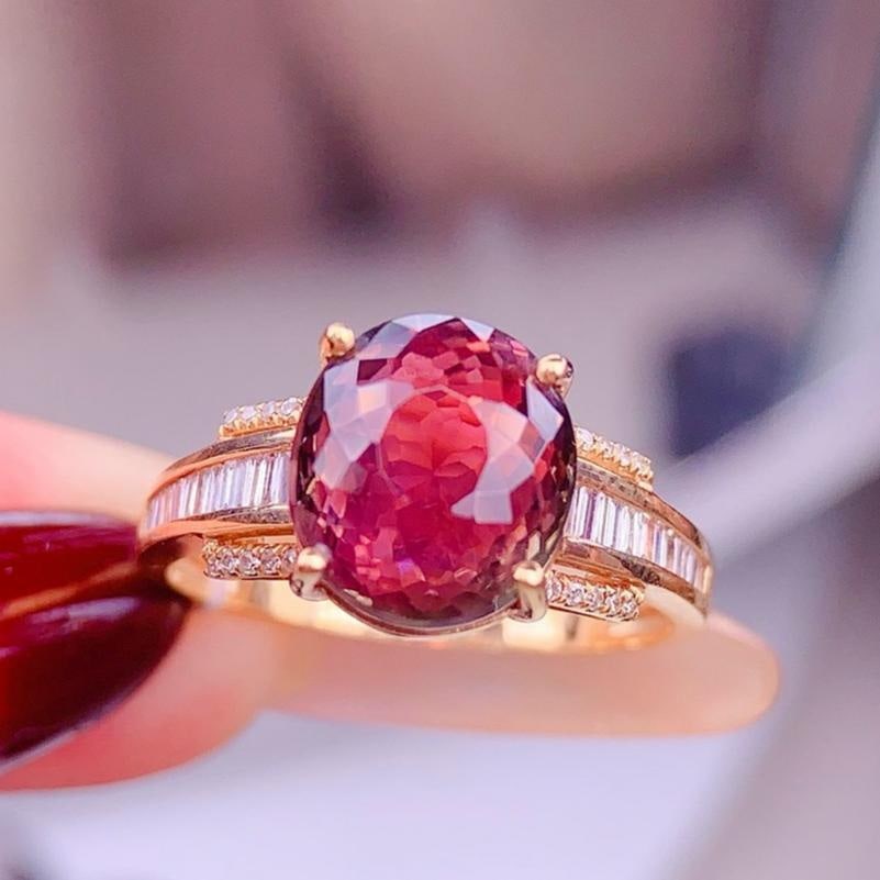 14k Gold 4.5 Ct Natural Tourmaline & Diamond Ring: Ref:231185113 // gold content:14k gold // ring size:7. 25us // // main gemstone:tourmaline // shape:oval // carat weight:4. 5ct // color:orangish red // treatment:natural // // adjacent gemstone 2 :