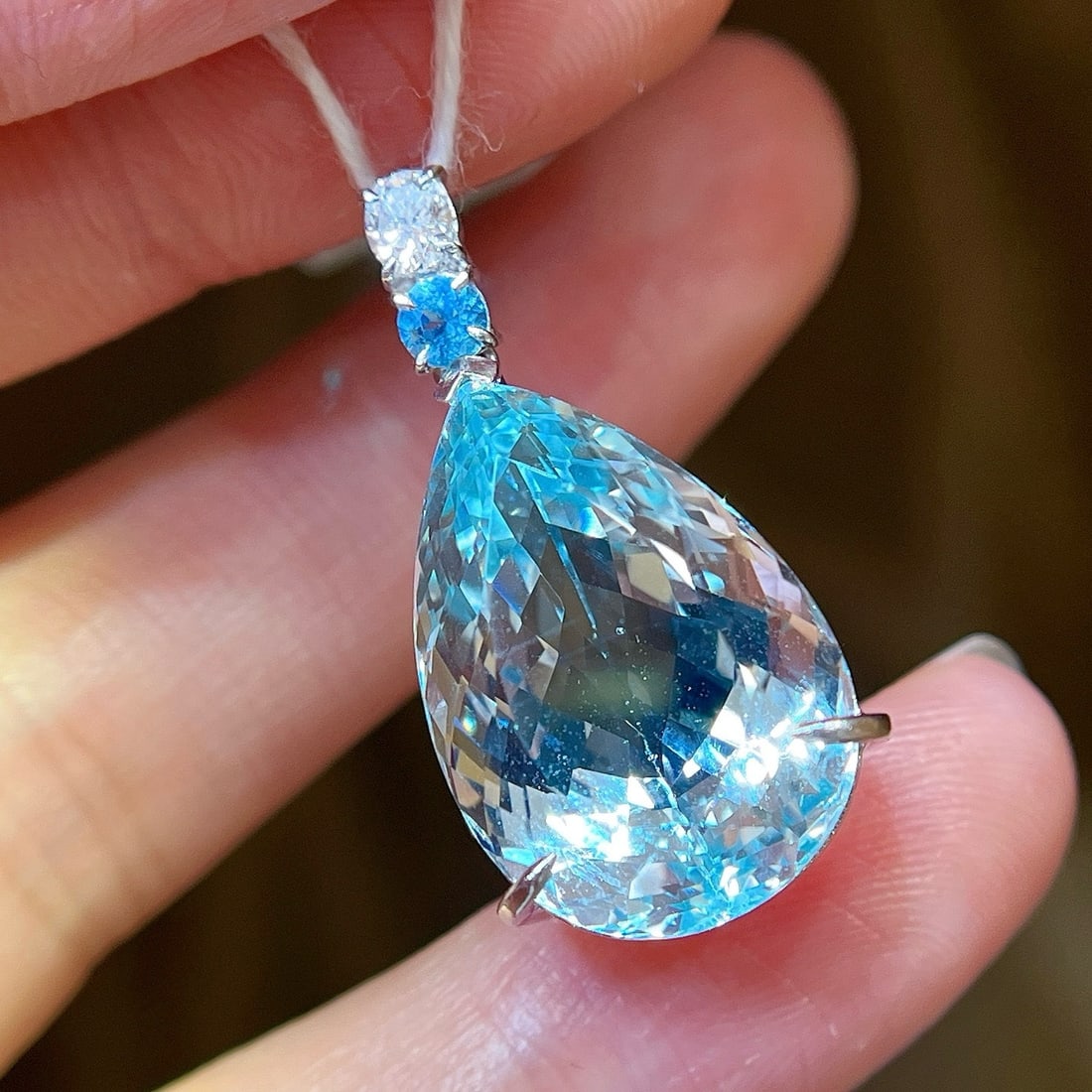 14k Gold 14.29 Ctw Natural Aquamarine & Diamond Pendant( Without Chain ): Ref:231185119 // gold content:14k gold // main gemstone:aquamarine // shape:pear // carat weight:14. 19ct // color:blue // treatment:natural // // adjacent gemstone 2 : diamond // shape:round //