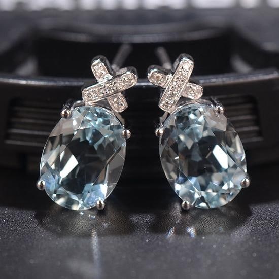 14k Gold 3.69 Ctw Natural Aquamarine & Diamond Earrings: Ref:231185121 // gold content:14k gold // main gemstone:aquamarine // number of stones:2 // shape:oval // carat weight:3. 65ct // color:blue // treatment:natural // // adjacent gemstone 2 : diamond