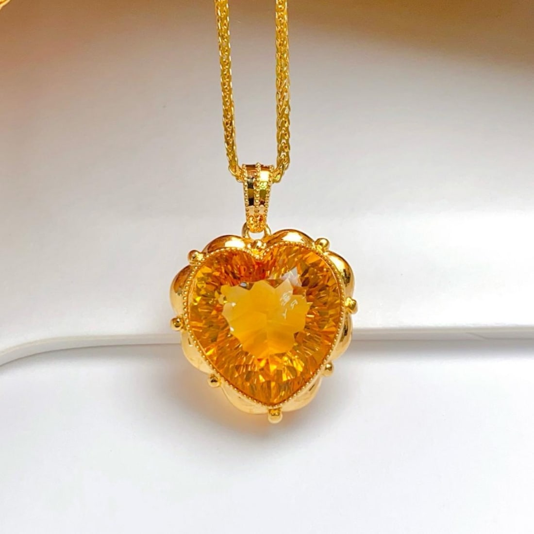 14k Gold 8.80 Ct Natural Citrine Pendant( Without Chain ): Ref:231185123 // gold content:14k gold // main gemstone:citrine // shape:heart // carat weight:8. 80ct // color:yellow // treatment:natural // Condition: New Low Estimate: 1900.00 High Estimate:
