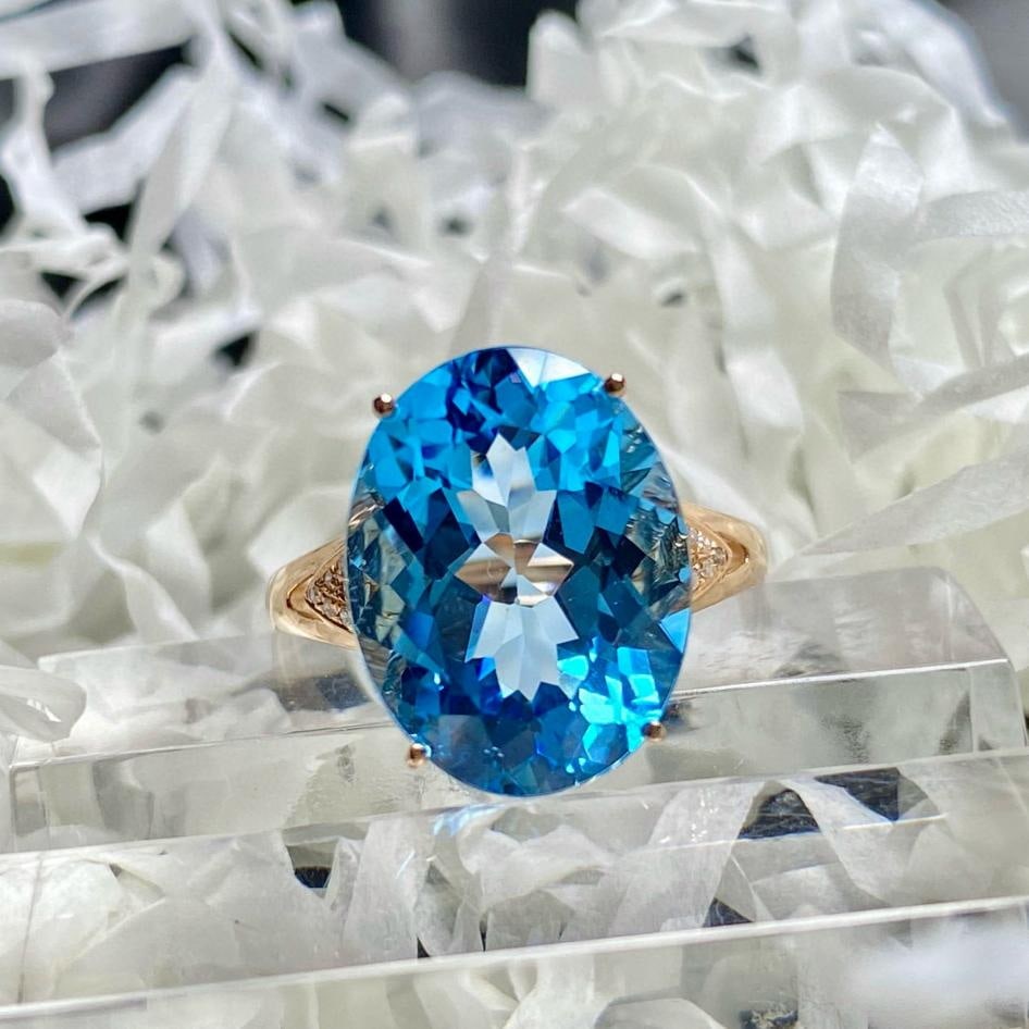 14k Gold 9.25 Ct Natural Topaz & Diamond Ring: Ref:231185139 // gold content:14k gold // ring size:7. 25us // // main gemstone:topaz // shape:oval // carat weight:9. 25ct // color:blue // treatment:natural // // adjacent gemstone 2 : diamond // nu