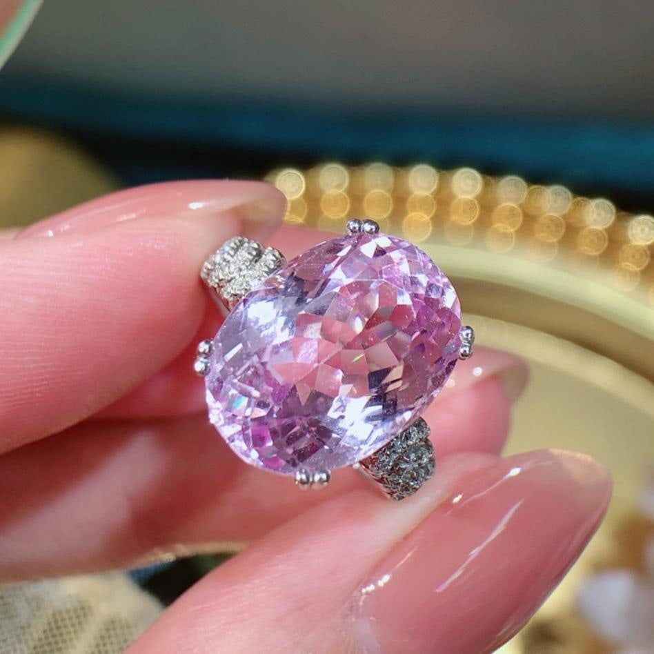 14k Gold 9.2 Ct Natural Kunzite & Diamond Ring: Ref:231185143 // gold content:14k gold // ring size:7. 25us // // main gemstone:kunzite // shape:oval // carat weight:9. 2ct // color:purplish pink // treatment:natural // // adjacent gemstone 2 :