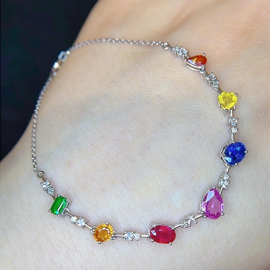 14k Gold 3.18 Ctw Natural Coloured Gemstone & Sapphire Bracelet: Ref:231185146 // gold content:14k gold // main gemstone:coloured gemstone // number of stones:7 // shape:multiple // carat weight:2. 89ct // color:color // treatment:natural // // adjacent gemstone 2