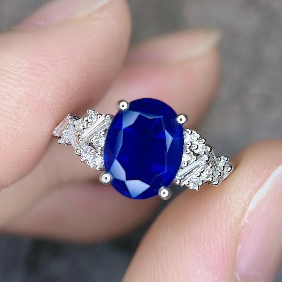 14k Gold 2.55 Ctw Natural Sapphire & Diamond Ring: Ref:231185155 // gold content:14k gold // ring size:7. 25us // // main gemstone:sapphire // shape:oval // carat weight:2. 33ct // color:royal blue // treatment:natural // // adjacent gemstone 2 :