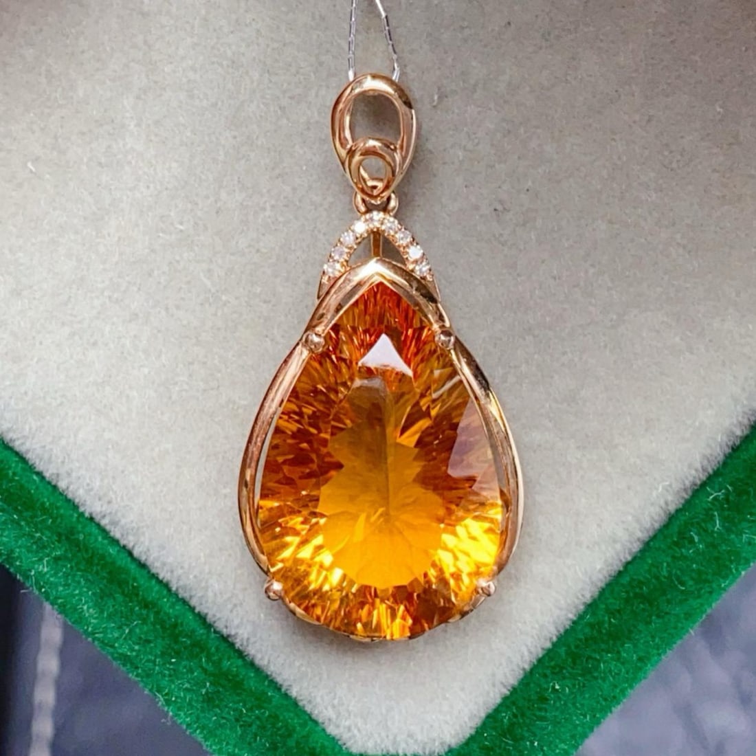 14k Gold 9.22 Ctw Natural Citrine & Diamond Pendant( Without Chain ): Ref:231185175 // gold content:14k gold // main gemstone:citrine // shape:pear // carat weight:9. 2ct // color:yellow // treatment:natural // // adjacent gemstone 2 : diamond // number of stones:9 //