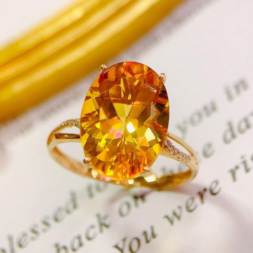 14k Gold 5.35 Ctw Natural Citrine & Diamond Ring: Ref:231185176 // gold content:14k gold // ring size:7. 25us // // main gemstone:citrine // shape:oval // carat weight:5. 3ct // color:yellow // treatment:natural // // adjacent gemstone 2 : diamond