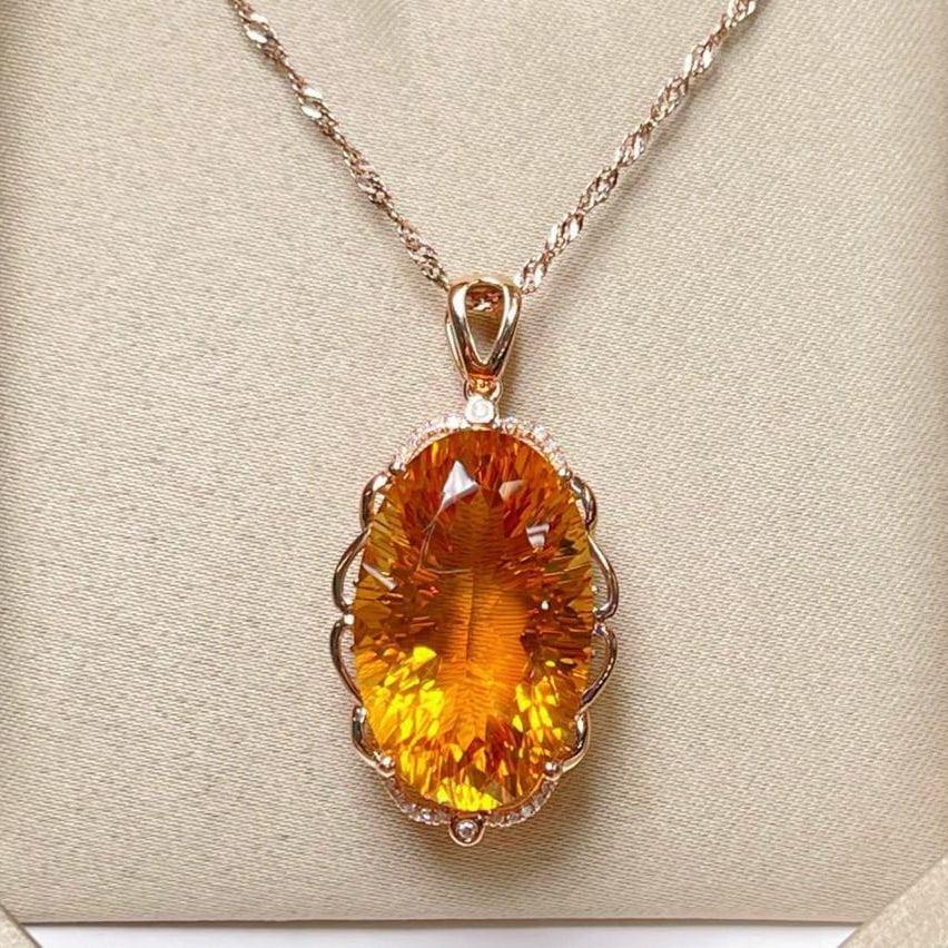 14k Gold 19.02 Ctw Natural Citrine & Diamond Pendant( Without Chain ): Ref:231185177 // gold content:14k gold // main gemstone:citrine // shape:oval // carat weight:18. 95ct // color:yellow // treatment:natural // // adjacent gemstone 2 : diamond // number of stones:22 /