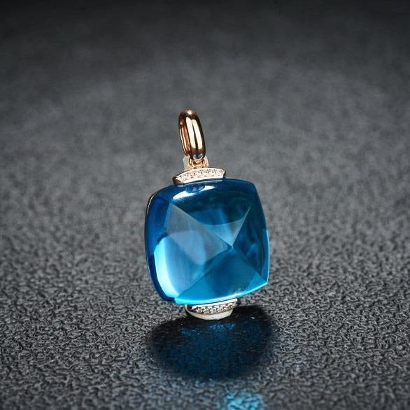 14k Gold 29.12 Ct Natural Topaz & Diamond Pendant( Without Chain ): Ref:231185193 // gold content:14k gold // main gemstone:topaz // shape:sugar-loaf // carat weight:29. 12ct // color:blue // treatment:natural // // adjacent gemstone 2 : diamond // shape:round //