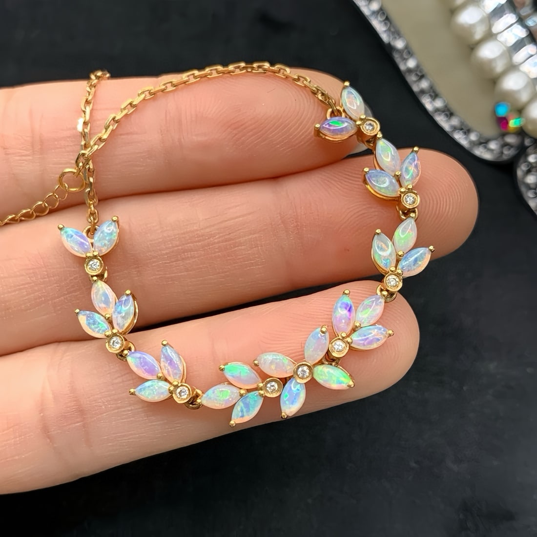 14k Gold 2.30 Ctw Natural Opal & Diamond Bracelet: Ref:231185211 // gold content:14k gold // main gemstone:opal // shape:marquise // carat weight:2. 21ct // color:white // treatment:natural // // adjacent gemstone 2 : diamond // number of stones:9 // 