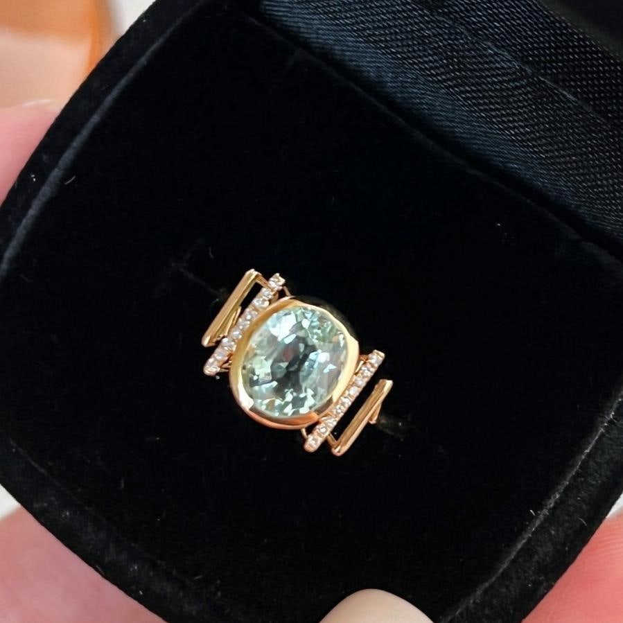 14k Gold 1.9 Ct Natural Tourmaline & Diamond Ring: Ref:231185217 // gold content:14k gold // ring size:7. 25us // // main gemstone:tourmaline // shape:oval // carat weight:1. 9ct // color:green // treatment:natural // // adjacent gemstone 2 : diamond