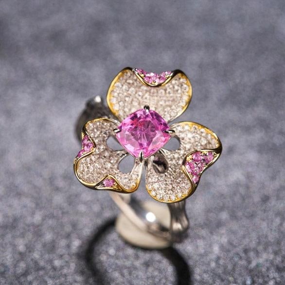 14k Gold 1.51 Ctw Natural Padparadscha Sapphire & Diamond & Flowers Ring: Ref:231186003 // gold content:14k gold // ring size:7. 25us // // main gemstone:padparadscha sapphire // shape:cushion // carat weight:0. 96ct // color:orangish pink // treatment:natural // // adjacen