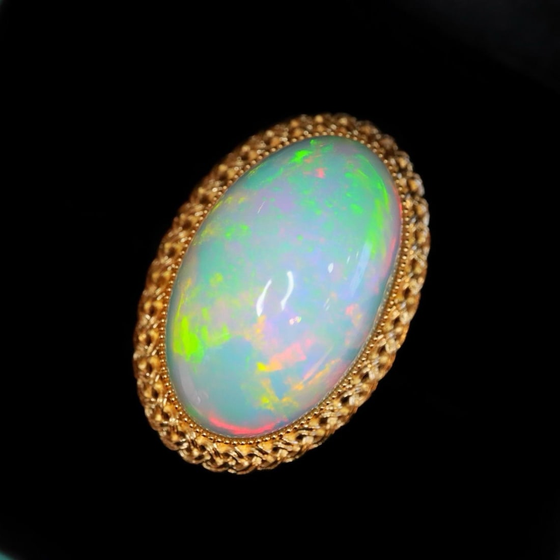 14k Gold 14.03 Ct Natural Opal Ring: Ref:231186006 // gold content:14k gold // ring size:7. 25us // // main gemstone:opal // shape:oval // carat weight:14. 03ct // color:white // treatment:natural // Condition: New Low Estimate: 6400.00