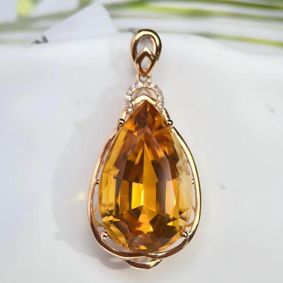 14k Gold 14.43 Ctw Natural Citrine & Diamond Pendant( Without Chain ): Ref:231186025 // gold content:14k gold // main gemstone:citrine // shape:pear // carat weight:14. 4ct // color:yellow // treatment:natural // // adjacent gemstone 2 : diamond // number of stones:12