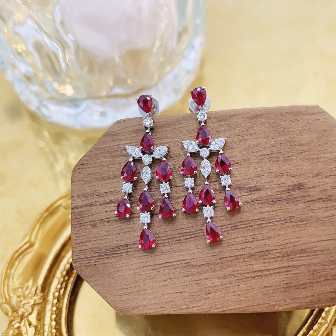 14k Gold 3.38 Ctw Natural Ruby & Diamond Earrings: Ref:231186031 // gold content:14k gold // main gemstone:ruby // shape:pear // carat weight:2. 72ct // color:red // treatment:natural // // adjacent gemstone 2 : diamond // shape:multiple // carat