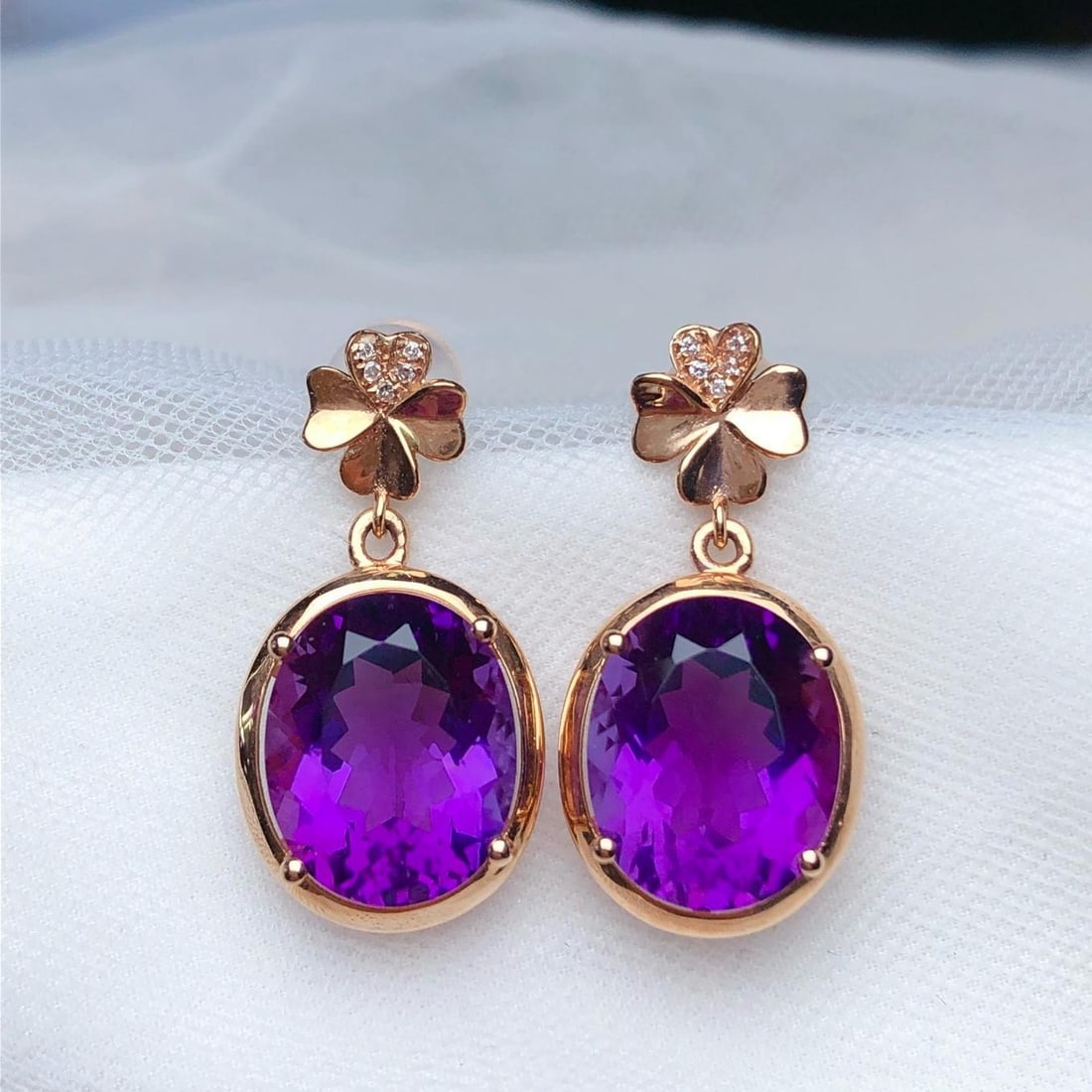 14k Gold 7.25 Ct Natural Amethyst & Diamond Earrings: Ref:231186073 // gold content:14k gold // main gemstone:amethyst // shape:oval // carat weight:7. 25ct // color:purple // treatment:natural // // adjacent gemstone 2 : diamond // number of stones:10