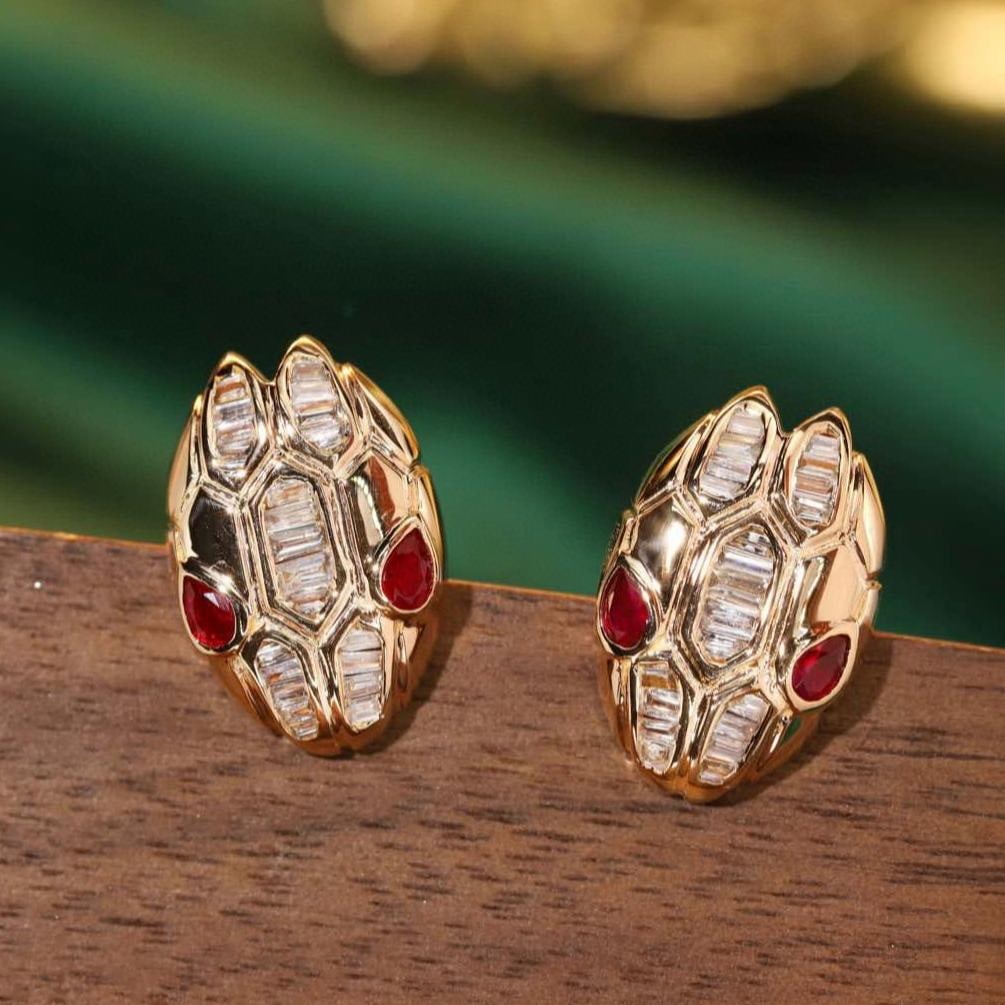 14k Gold 0.72 Ctw Natural Ruby & Diamond & Snake Earrings: Ref:231186090 // gold content:14k gold // main gemstone:ruby // shape:pear // carat weight:0. 32ct // color:red // treatment:natural // // adjacent gemstone 2 : diamond // shape:baguette // carat