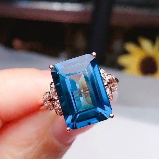 14k Gold 8.15 Ct Natural Topaz & Diamond Ring: Ref:231186101 // gold content:14k gold // ring size:7. 25us // // main gemstone:topaz // shape:octagonal // carat weight:8. 15ct // color:blue // treatment:natural // // adjacent gemstone 2 : diamond 