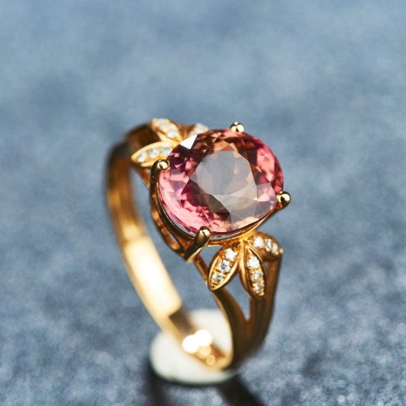 14k Gold 3.8 Ct Natural Tourmaline & Diamond Ring: Ref:231186102 // gold content:14k gold // ring size:7. 25us // // main gemstone:tourmaline // shape:oval // carat weight:3. 8ct // color:red // treatment:natural // // adjacent gemstone 2 : diamond