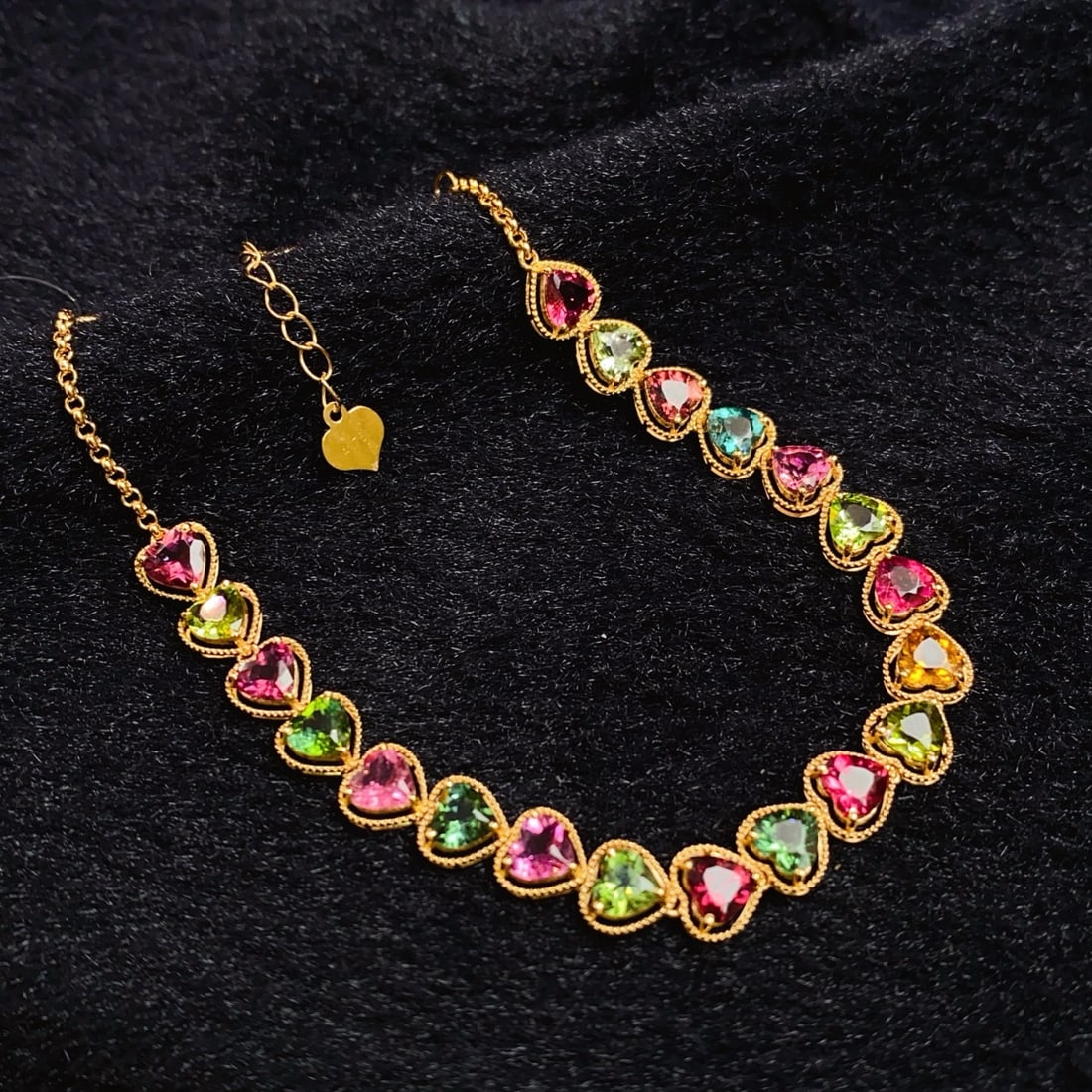 14k Gold 6.00 Ct Natural Tourmaline Bracelet: Ref:231186104 // gold content:14k gold // main gemstone:tourmaline // shape:heart // carat weight:6. 00ct // color:color // treatment:natural // Condition: New Low Estimate: 4000.00 High Estimate: