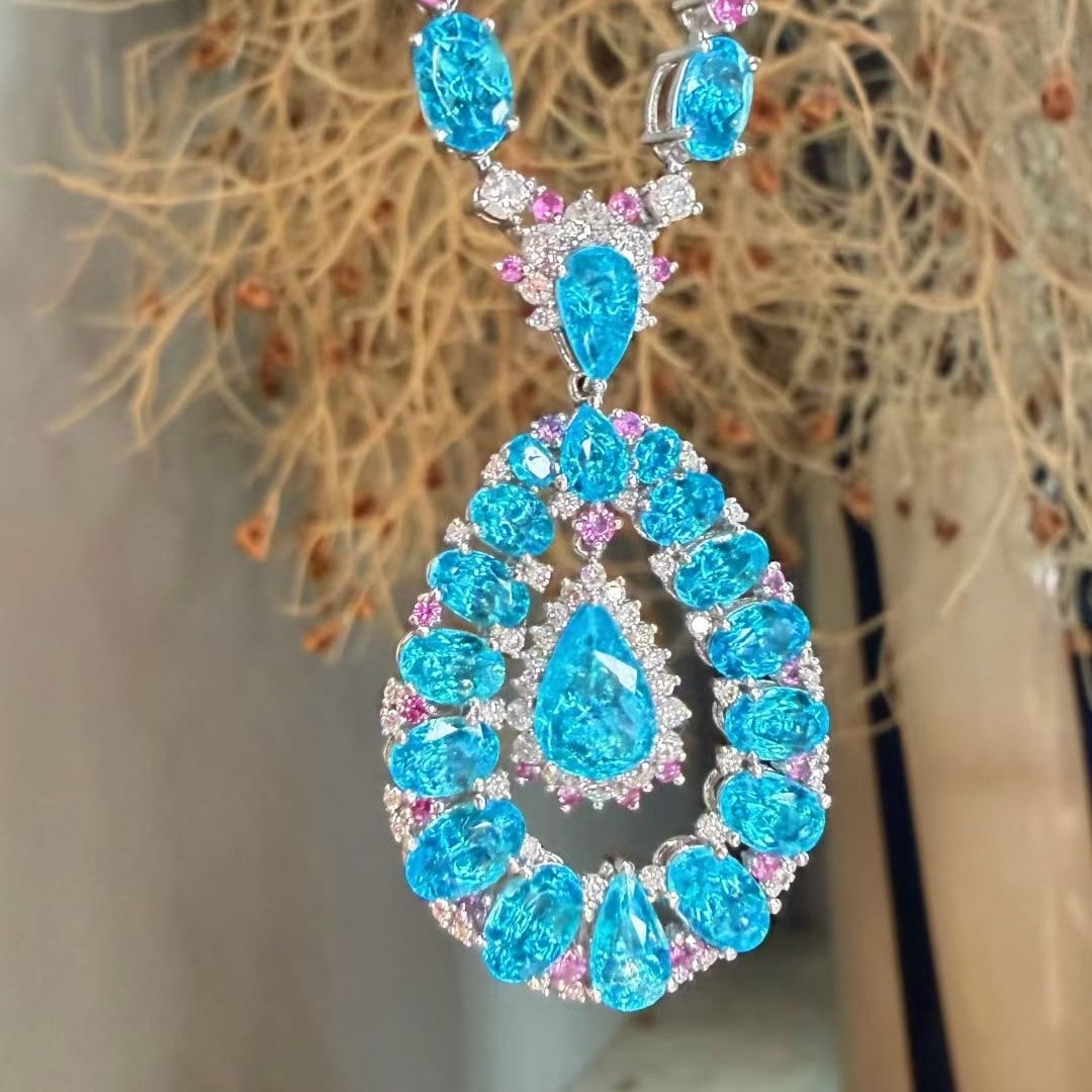 14k Gold 12.4 Ctw Natural Paraiba Tourmaline & Diamond Necklace: Ref:231186108 // gold content:14k gold // main gemstone:paraiba tourmaline // shape:multiple // carat weight:10. 8ct // color:blue // treatment:natural // // adjacent gemstone 2 : diamond //