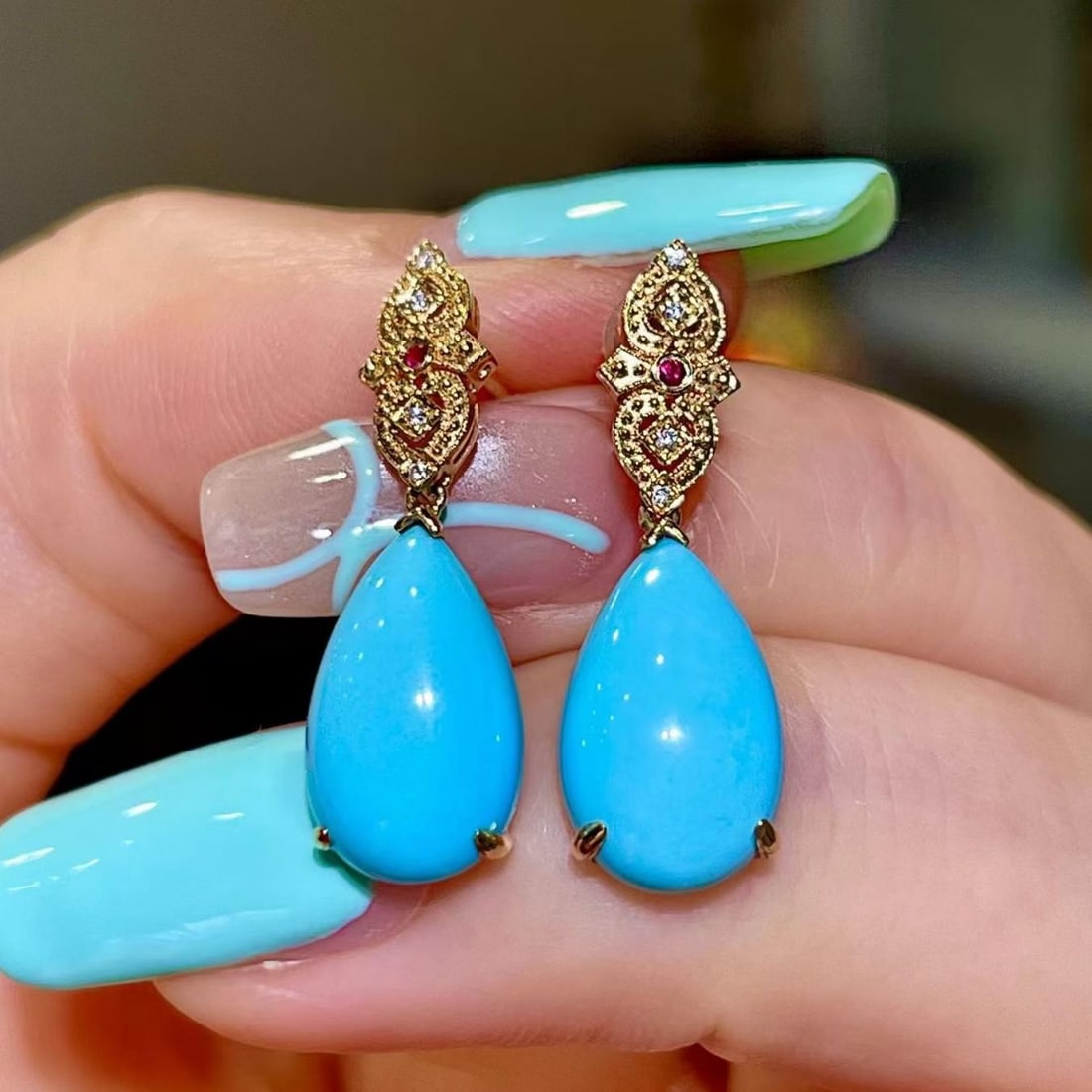 14k Gold 5.68 Ct Natural Blue Turquoise & Diamond & Ruby Earrings: Ref:231186111 // gold content:14k gold // main gemstone:blue turquoise // shape:pear // carat weight:5. 68ct // color:blue // treatment:natural // // adjacent gemstone 2 : diamond // shape:round // cl