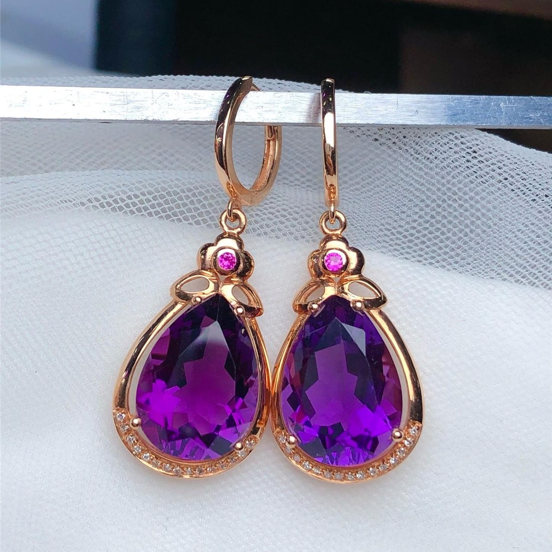 14k Gold 9.90 Ct Natural Amethyst & Diamond Earrings: Ref:231186165 // gold content:14k gold // main gemstone:amethyst // shape:pear // carat weight:9. 90ct // color:purple // treatment:natural // // adjacent gemstone 2 : diamond // number of stones:30