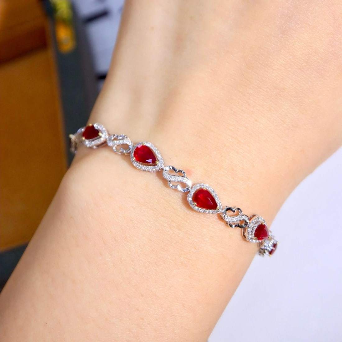 14k Gold 3.84 Ctw Natural Ruby & Diamond Bracelet: Ref:231186171 // gold content:14k gold // main gemstone:ruby // shape:pear // carat weight:3. 3ct // color:red // treatment:natural // // adjacent gemstone 2 : diamond // shape:round // carat
