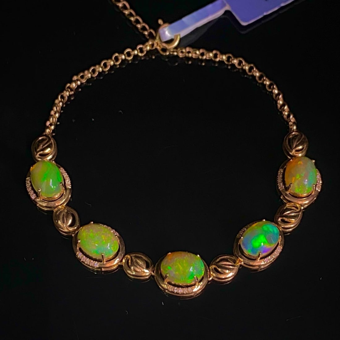 14k Gold 4.05 Ct Natural Opal & Diamond Bracelet: Ref:231186179 // gold content:14k gold // main gemstone:opal // shape:oval // carat weight:4. 05ct // color:color // treatment:natural // // adjacent gemstone 2 : diamond // number of stones:50 //