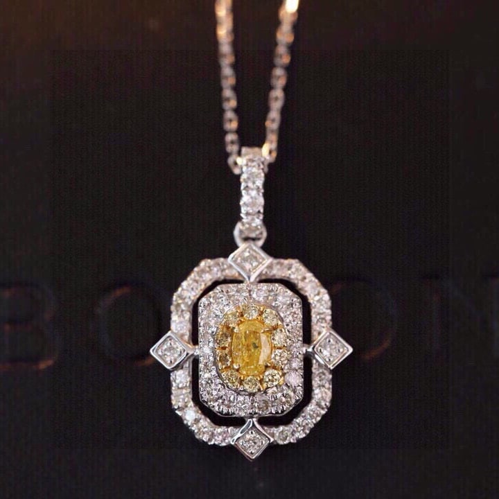 14k Gold 0.45 Ctw Natural Yellow Diamond & Diamond Necklace: Ref:231186187 // gold content:14k gold // main gemstone:yellow diamond // shape:oval // carat weight:0. 12ct // color:yellow // treatment:natural // // adjacent gemstone 2 : diamond // shape:round //