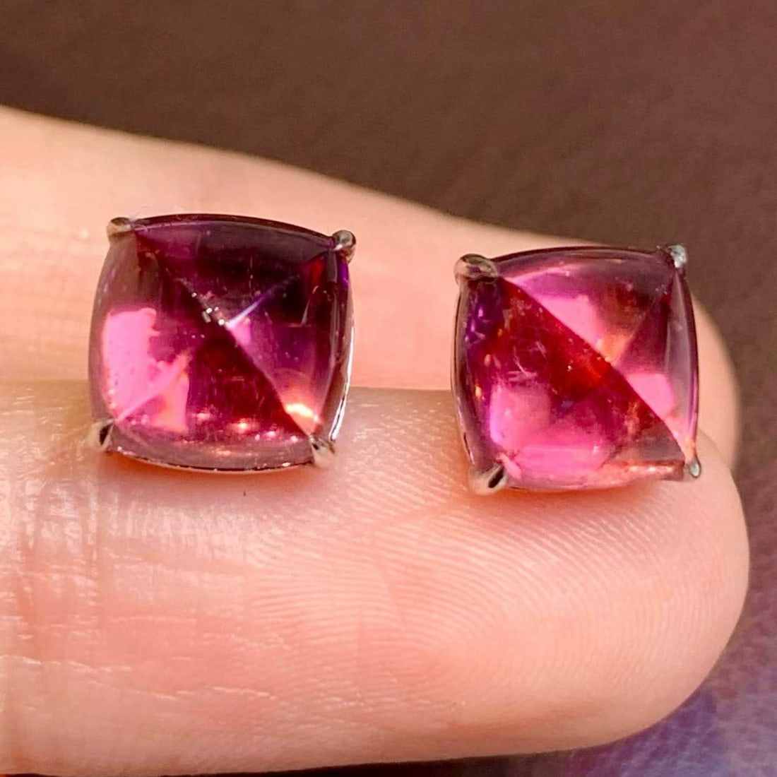 14k Gold 6.2 Ct Natural Tourmaline Earrings: Ref:231186204 // gold content:14k gold // main gemstone:tourmaline // shape:sugar-loaf // carat weight:6. 2ct // color:red // treatment:natural // Condition: New Low Estimate: 4200.00 High Estimate:
