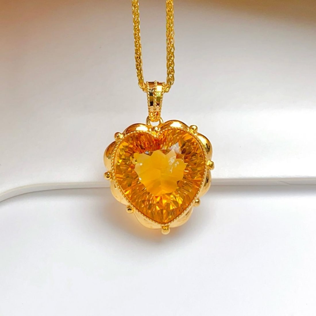 14k Gold 8.80 Ct Natural Citrine Pendant( Without Chain ): Ref:231186212 // gold content:14k gold // main gemstone:citrine // shape:heart // carat weight:8. 80ct // color:yellow // treatment:natural // Condition: New Low Estimate: 1900.00 High Estimate: