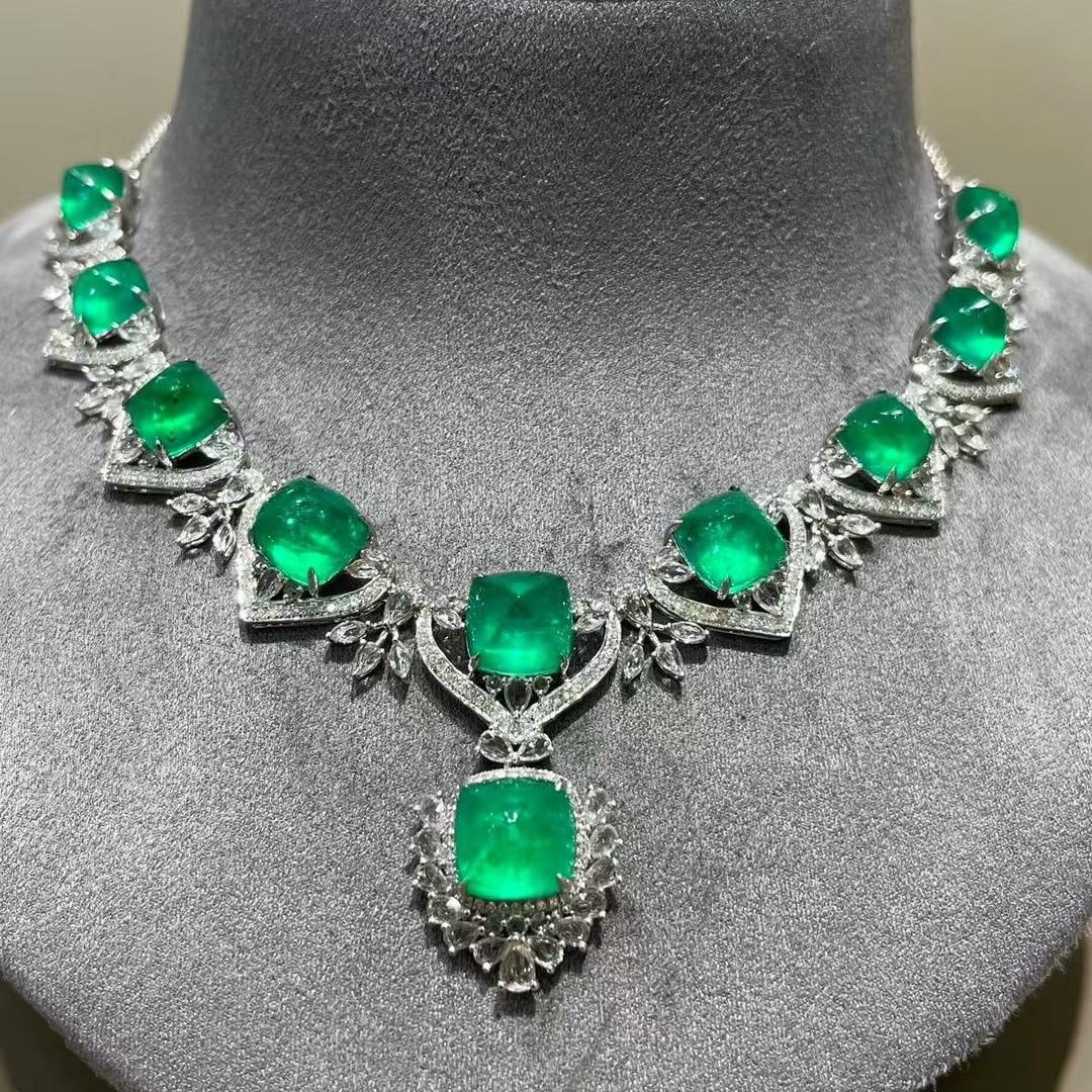 14k Gold 22.1 Ct Natural Emerald & Diamond & Sapphire Necklace: Ref:231186235 // gold content:14k gold // main gemstone:emerald // shape:sugar-loaf // carat weight:22. 1ct // color:green // treatment:natural // // adjacent gemstone 2 : diamond // shape:round //