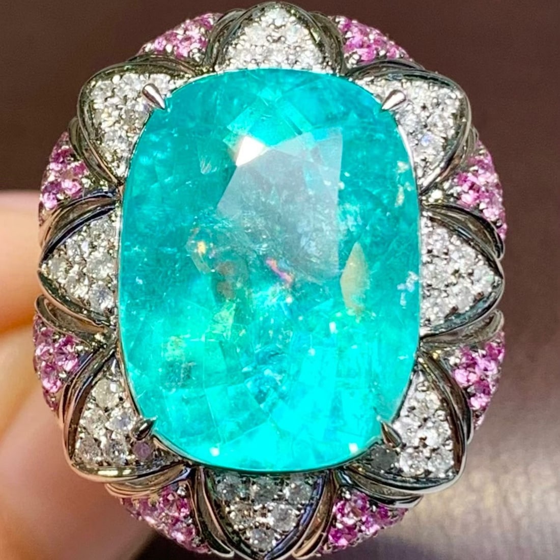 14k Gold 15.32 Ct Natural Paraiba Tourmaline & Diamond Ring: Ref:231186250 // gold content:14k gold // ring size:7. 25us // // main gemstone:paraiba tourmaline // shape:cushion // carat weight:15. 32ct // color:neon blue // treatment:natural // // adjacent gems