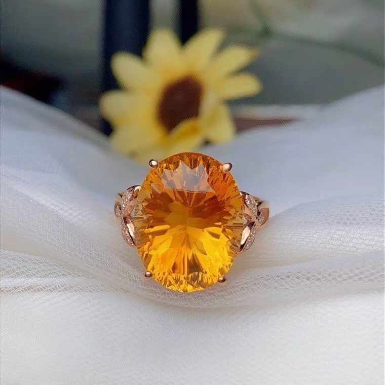 14k Gold 9.70 Ct Natural Citrine & Diamond Ring: Ref:231186252 // gold content:14k gold // ring size:7. 25us // // main gemstone:citrine // shape:oval // carat weight:9. 70ct // color:yellow // treatment:natural // // adjacent gemstone 2 : diamond