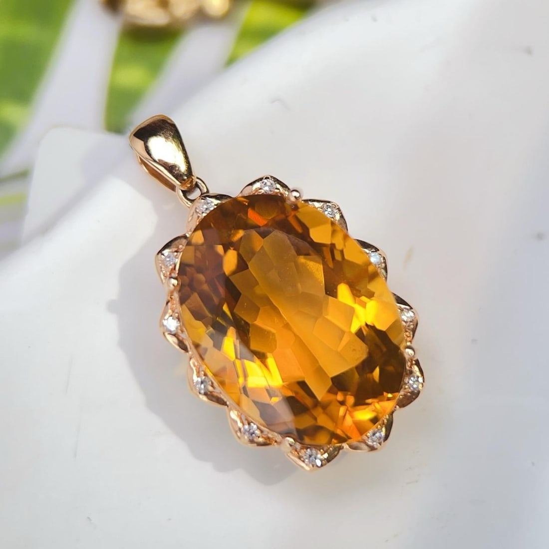 14k Gold 12.76 Ctw Natural Citrine & Diamond Pendant( Without Chain ): Ref:231186253 // gold content:14k gold // main gemstone:citrine // shape:oval // carat weight:12. 7ct // color:yellow // treatment:natural // // adjacent gemstone 2 : diamond // number of stones:12