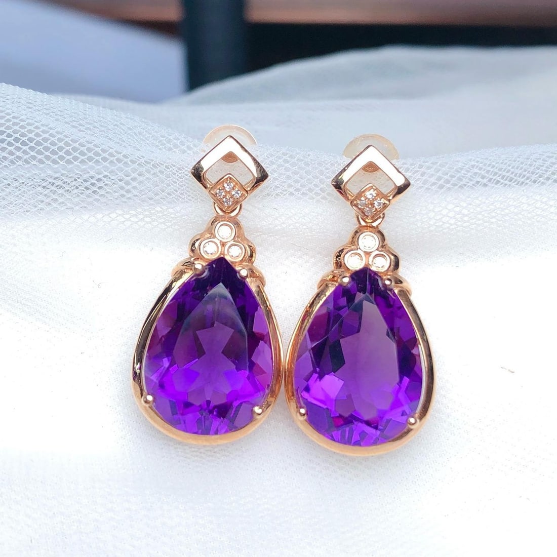 14k Gold 10.05 Ct Natural Amethyst & Diamond Earrings: Ref:231186254 // gold content:14k gold // main gemstone:amethyst // shape:pear // carat weight:10. 05ct // color:purple // treatment:natural // // adjacent gemstone 2 : diamond // number of stones:14