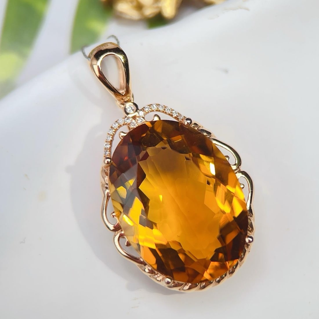 14k Gold 16.50 Ctw Natural Citrine & Diamond Pendant( Without Chain ): Ref:231186296 // gold content:14k gold // main gemstone:citrine // shape:oval // carat weight:16. 45ct // color:yellow // treatment:natural // // adjacent gemstone 2 : diamond // number of stones:17