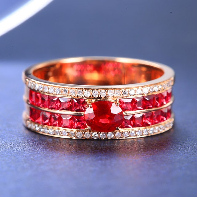 14k Gold 1.37 Ctw Natural Ruby & Ruby Ring: Ref:231186303 // gold content:14k gold // ring size:7. 25us // // main gemstone:ruby // shape:oval // carat weight:0. 53ct // color:red // treatment:natural // // adjacent gemstone 2 : ruby //