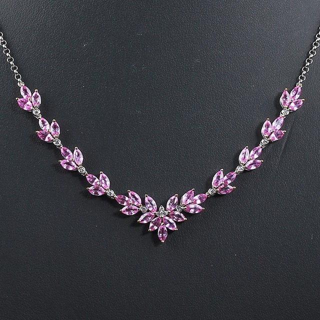 14k Gold 7.35 Ctw Natural Padparadscha Sapphire & Diamond Necklace: Ref:231186308 // gold content:14k gold // main gemstone:padparadscha sapphire // shape:marquise // carat weight:7. 2ct // color:orangish pink // treatment:natural // // adjacent gemstone 2 : diamond